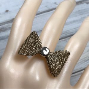 Gold tone mesh bow ring